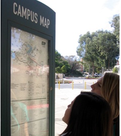 Image of students looking at a map